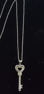 ZALES sterling silver and white  sapphire necklace